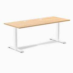 Desky Zero fixed height office desk with Sublime Teak laminate top, white steel frame, and two grommets.