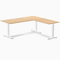 Sublime Teak laminate L-shape office desk with white steel frame and grommets.