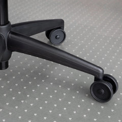 Translucent PVC Desky Chair Mat with a subtle heart pattern under a black office chair base.