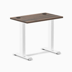Desky Zero Mini fixed-height desk with Jarrah Legno top, white legs, 32x20 inches, and grommets.