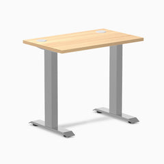 Desky Zero Mini sit-stand desk, Sublime Teak 32x20 inch top with grommets, gray legs.
