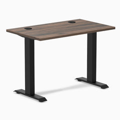 Desky Zero Mini sit-stand desk, Jarrah Legno 40x24 inch top with grommets, matte black legs.