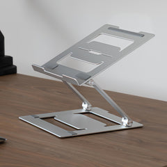 Laptop riser on top of desk