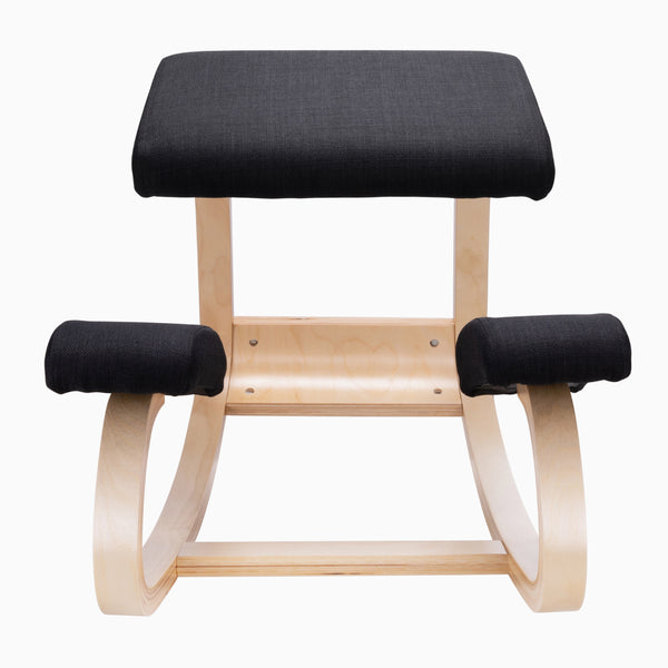 Desky Kneeling Chair with light beechwood frame and black mesh cushions.
