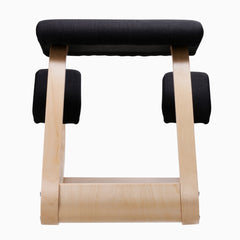 Desky Kneeling Chair with light beechwood frame and black mesh cushions.