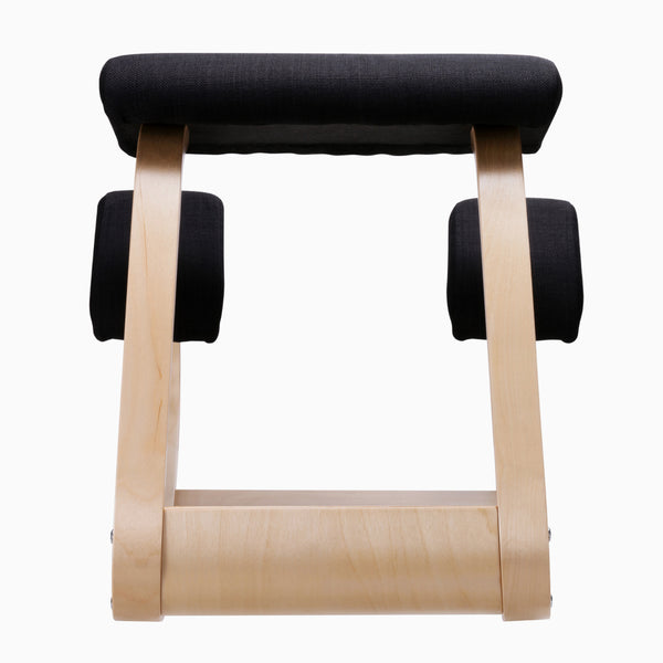 Desky Kneeling Chair with light beechwood frame and black mesh cushions.