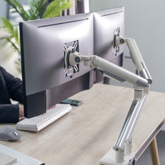 Desky Dual Slim Aluminium Monitor Arm in white with dual monitor set up