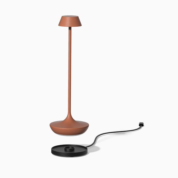 Desky nimbus rechargeable desk lamp with charging dock in terracotta