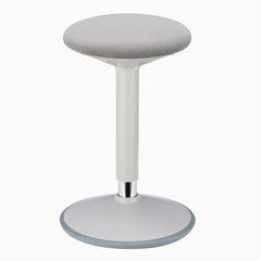 Minimalist white ergonomic stool