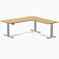 Desky Rubberwood L-Shape Sit Stand Desk, Light Oak desktop, Gray frame