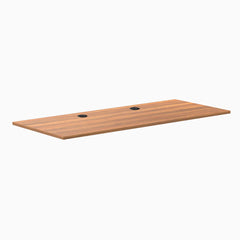 Prime Oak laminate desk top, 70.9" x 29.5", with two black grommets.