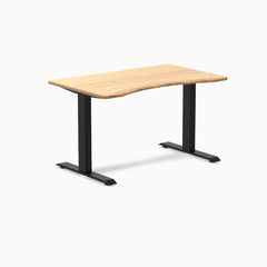 Desky Zero Ergo Edge Office Desk with a bamboo top and matte black frame.